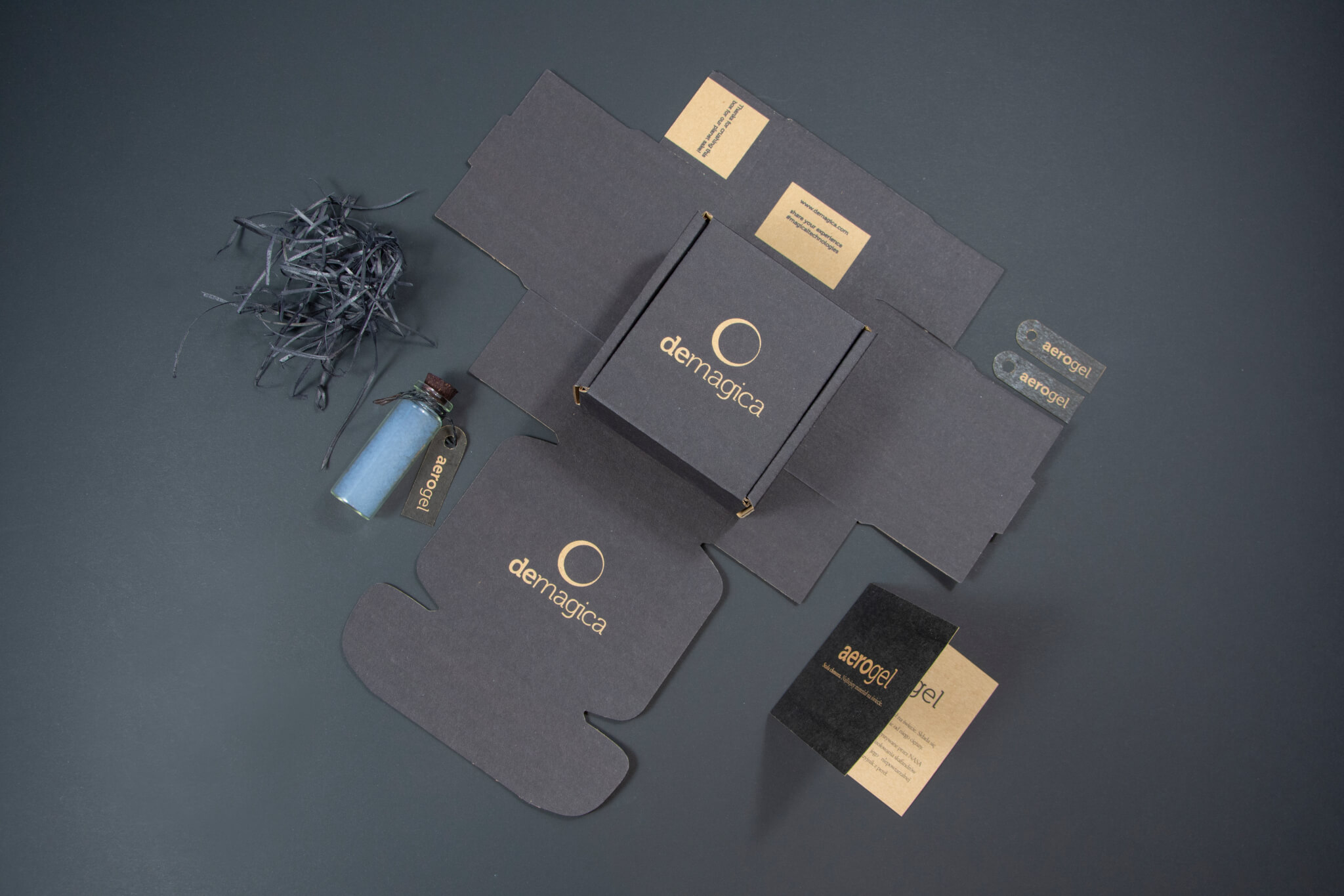 flatlay view of customised dark boxes by demagica