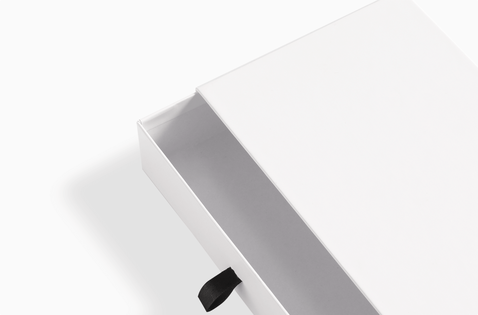Rigid box with pull-out drawer