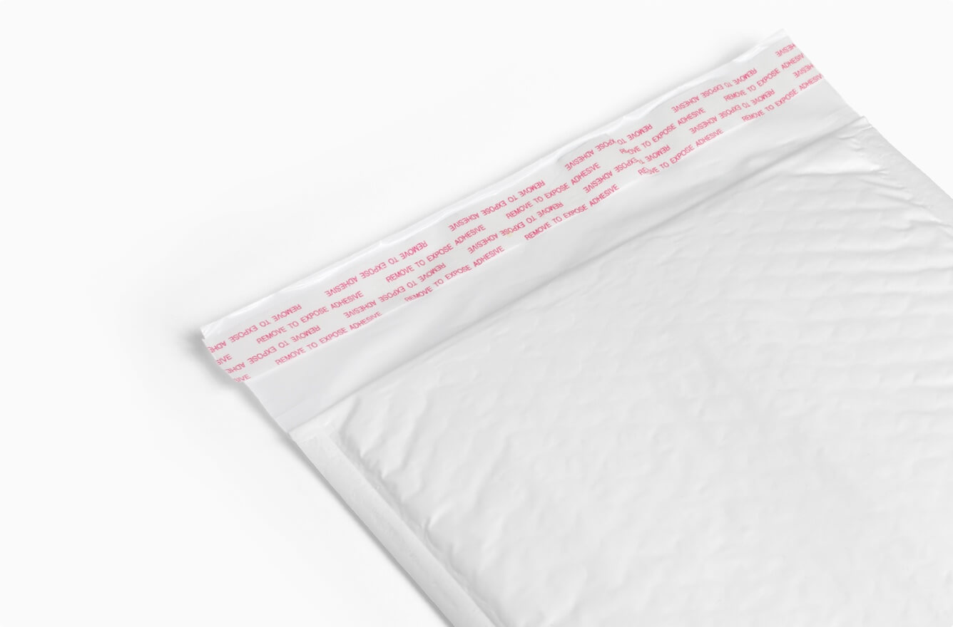 White bubble envelope with self-sealing strip